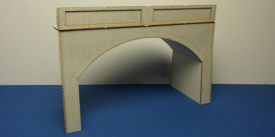 B 70-17P O gauge retaining wall tunnel portal Compatible with the other retaining wall elements.
